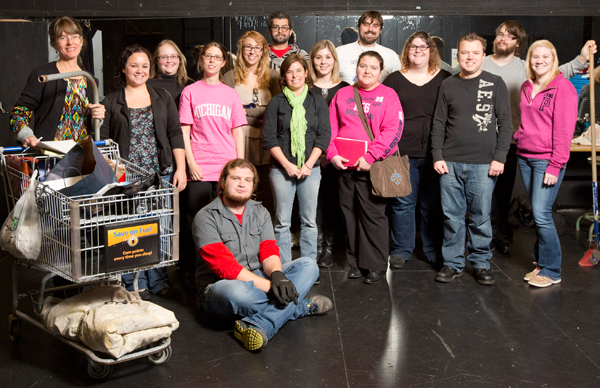 The English students who reassembled King Lear pose in UM-Flint's Black Box theatre