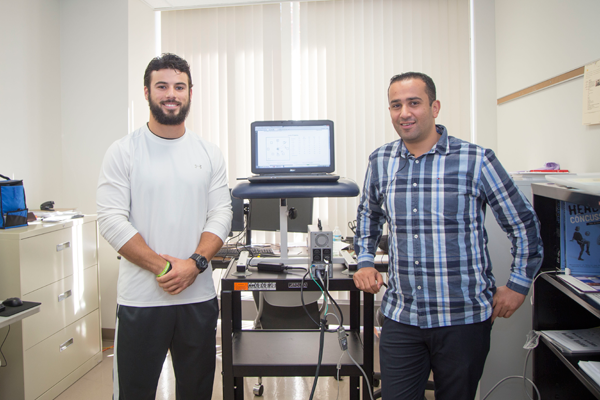 UM-Flint DPT student Mitch Babcock and Assistant Professor of Physical Therapy Bara Alsalaheen, PhD