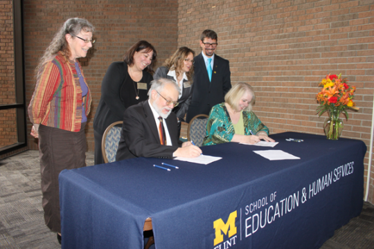 UM-Flint and Mott Community College sign new early childhood education agreement