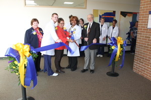 Chancellor Borrego cuts the ribbon at the opening of the Nursing Department's Clinical Simulation Center (CSC).