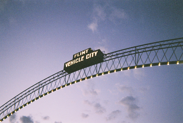 Photo of "Flint Vehicle City" arches at dusk.