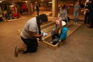 UM-Flint students building sheds for Habitat for Humanity