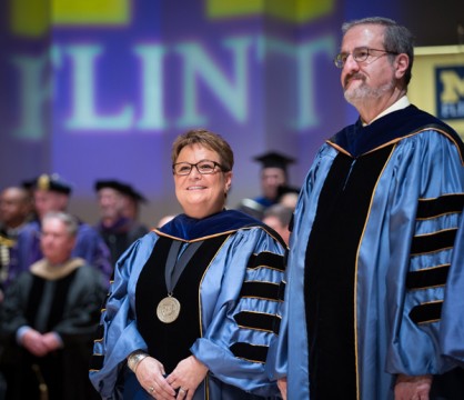 UM-Flint Chancellor Susan E. Borrego and U-M President Mark Schlissel.