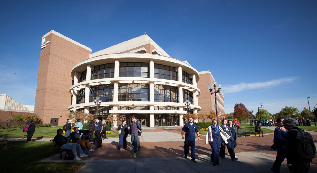 Students outside UM-Flint's William S. White Building.