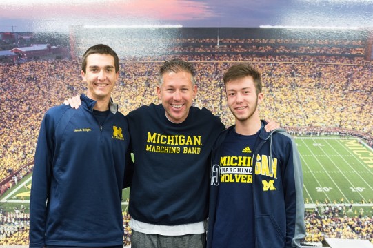UM-Flint student Jacob Wright, Michigan Marching Band director John Pasquale and UM-Flint student Luther Houle at a recent band rehearsal, (L to R).