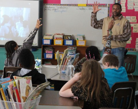 STAR Program Coordinator Richard Russell questions kids about historical events in "The Watson Go to Birmingham-1963."