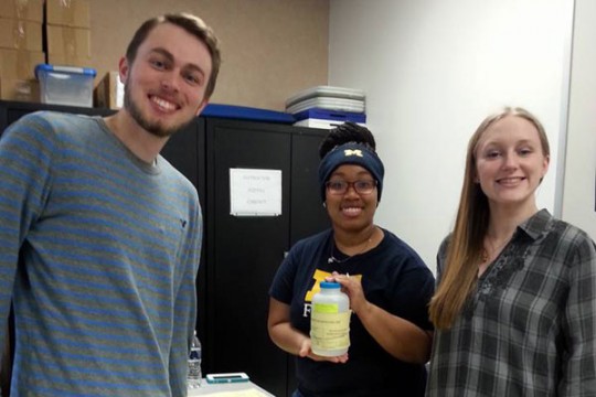 UM-Flint students assist the Red Cross during Flint water crisis.