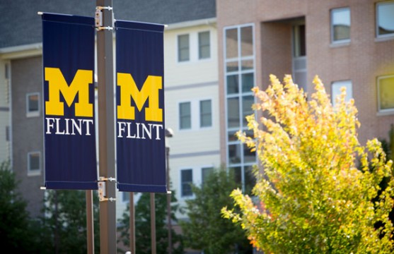 UM-Flint banners in front of First Street Residence Hall.