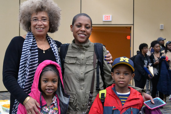 Angela Davis with social work major Kristen Twitty and her children