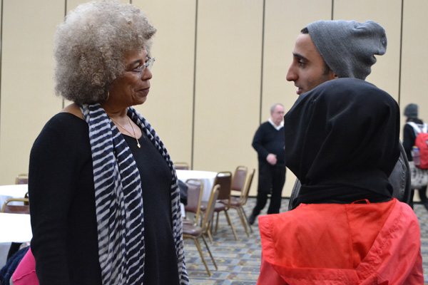 Angela Davis speaks with students after her final UM-Flint forum