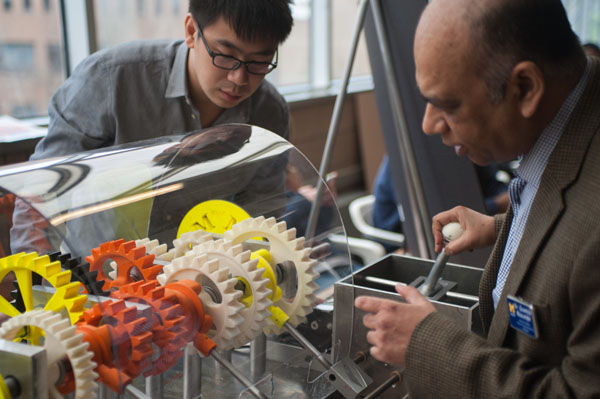 Dr. Quamrul Mazumder, Associate Chair and Associate Professor of Mechanical Engineering, operates the transmission project.