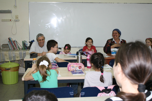 Visiting with staff and immigrants during Hebrew class in Ramla's Immigrant Absorption center.