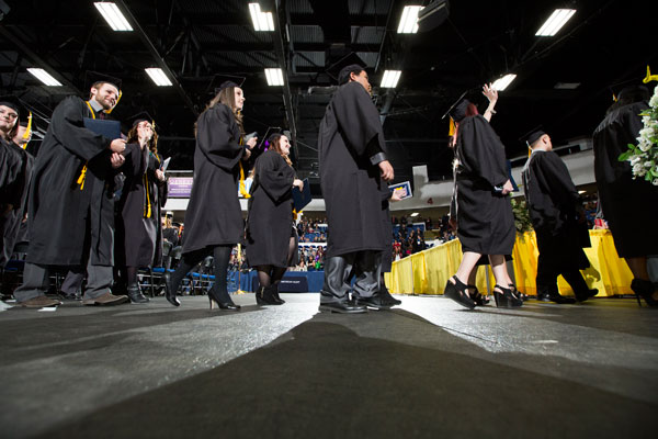 UM-Flint graduates at commencement ceremony.