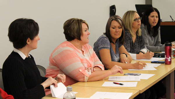 Education specialist graduate students provide feedback to interviewees.