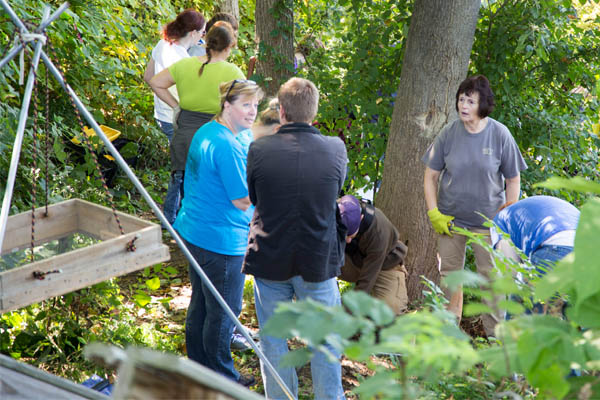 UM-Flint students on an archaeological dig with Dr. Bev Smith at Flint's Stockton House.