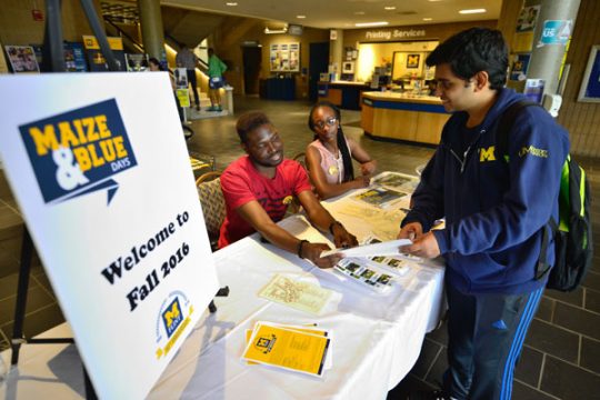 Info desk in the UCEN lobby during first day of Fall 2016 classes