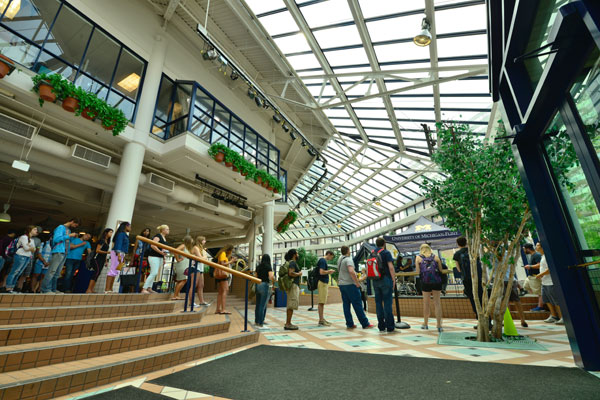 Students line up in the University Pavilion to get their student ID photo taken