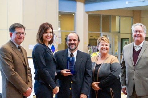 UM-Flint Provost Doug Knerr, Jocelyn Hagerman, Mark Simon, Chancellor Susan E. Borrego, and SOM Dean Scott Johnson at Simon’s investiture ceremony as director of the Hagerman Center for Entrepreneurship and Innovation.