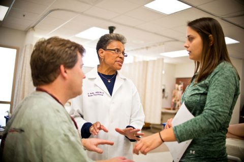 UM-Flint nursing faculty member Barbara Hollie, PhD, MSN, ANP-BC with students.