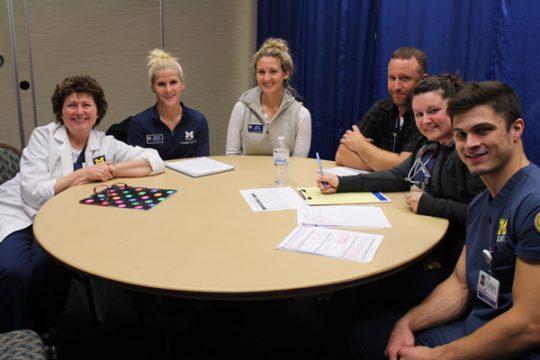 Participants in UM-Flint's interdisciplinary health care simulation