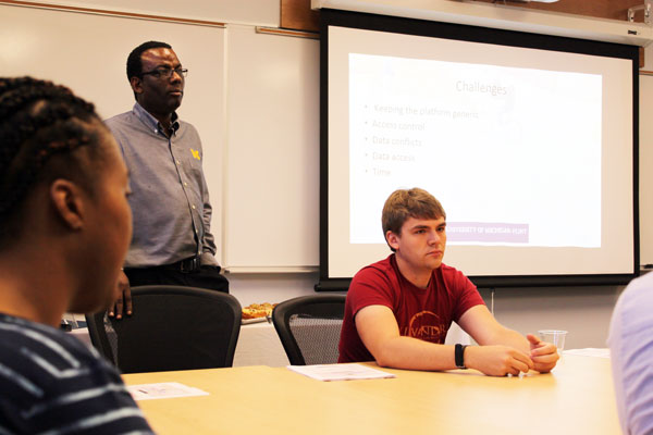 UM-Flint assistant professor of computer science Mark Allison and a student involved in the Google water app project