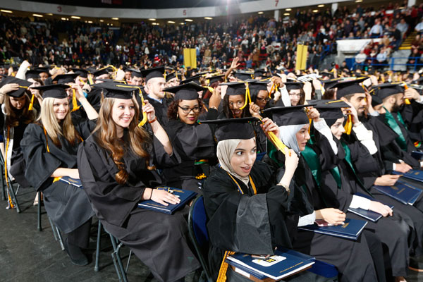 UM-Flint graduates turn their tassels at the 2016 December Commencement