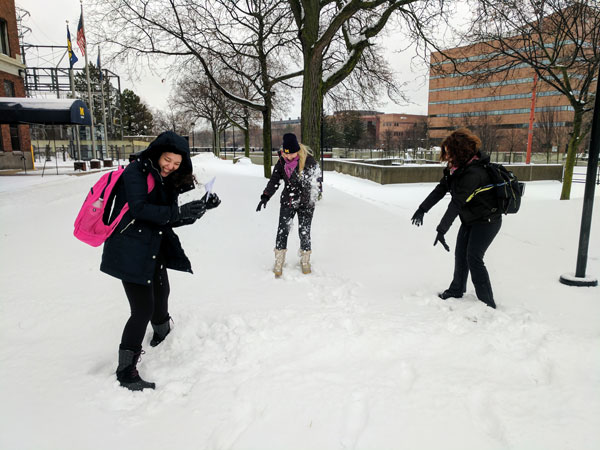 UM-Flint ELP students from Brazil experience a Michigan snow day.