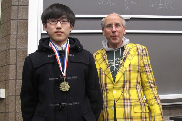 A 2015 Math Field Day participant and UM-Flint professor of mathematics Kenneth Schilling, sporting the "yellow jacket."