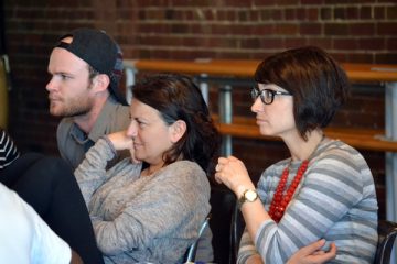 UM-Flint Theatre student Seth Barnes (left) and Department Chair Shelby Newport (right) sit at rehearsal with the production's director, Purni Morell of London's Unicorn Theatre