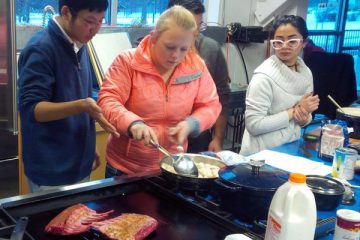 Students in UNV 100: Food and Culture prepare a meal for their final exam