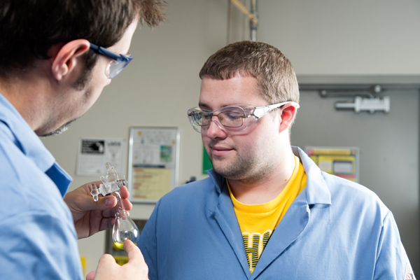 Associate Professor Nick Kingsley (left) working with Tyler Doyon (right) in a UM-Flint Chemistry lab