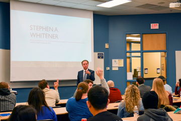 Alumnus Stephen A. Whitener speaks to UM-Flint business students