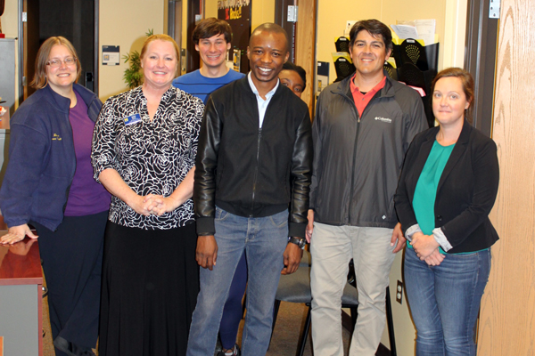 Adedotun Ojelabi with UM-Flint International Center colleagues.