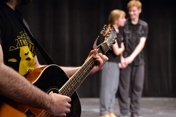 Seth Hart provides a melody during a romantic moment on stage.