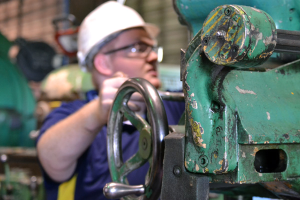 Aaron Latchaw working in the Huckleberry Railroad Locomotive Repair Shop