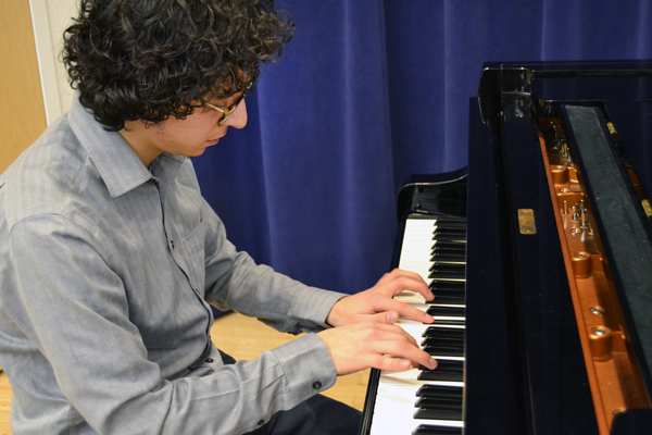 Antonio Caballero plays in the UM-Flint Music recital hall.