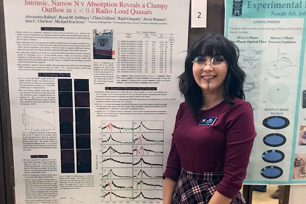 Alex Bakhsh of UM-Flint Physics presenting research at the Conference for Undergraduate Women in Physics