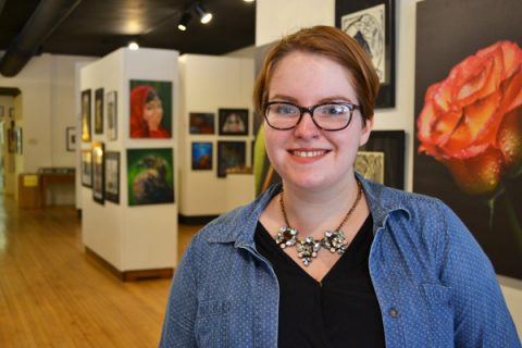 UM-Flint Art student Janice McCoy at the Greater Flint Arts Council student exhibition.