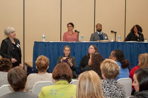 Mary Jo Finney, PhD, moderates the panel "A State of Crisis: Exploring solutions to counter systemic inequity," with Dr. Mona Hanna-Attisha, Lenwood Hayman, PhD, and Dr. Iheoma Ikura.