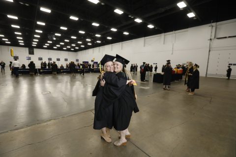 Madison McCrue (left) received her bachelor's of business administration; her mother, Toni LaRocco (right), is a faculty member in UM-Flint's School of Nursing.