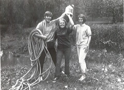 Alumnus David Zick (left) helps win tug-o-war tournament