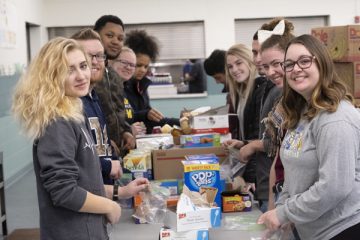 First-Year Experience students helping out at Flint's Center for Hope.