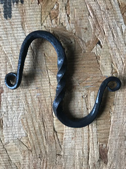 UM-Flint student Tabitha Robinson used her blacksmithing skills to make this hook.