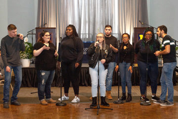 Students performing at the Celebrating Wolverine Excellence awards ceremony
