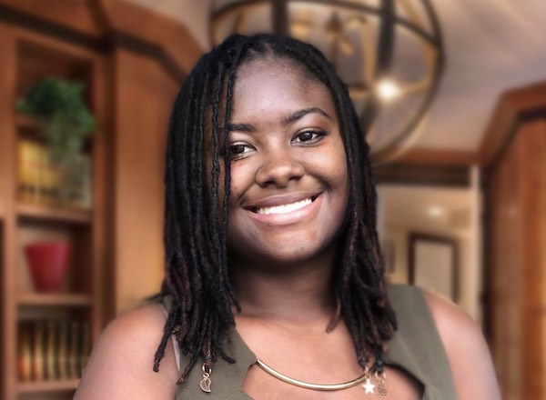 Georgina Brown, a UM-Flint student, smiles for a portrait.