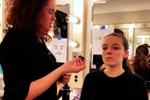 UM-Flint students give a makeup tutorial on how to create a zombie look