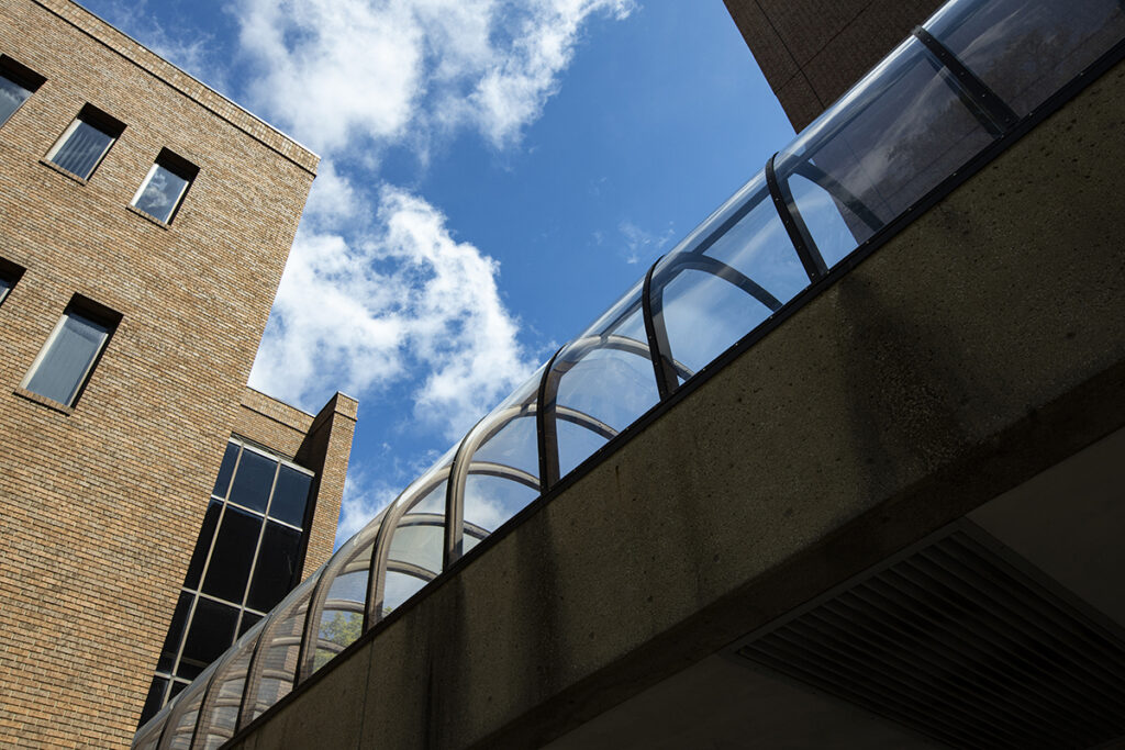 an exterior photo of a skywalk connecting two buildings. 