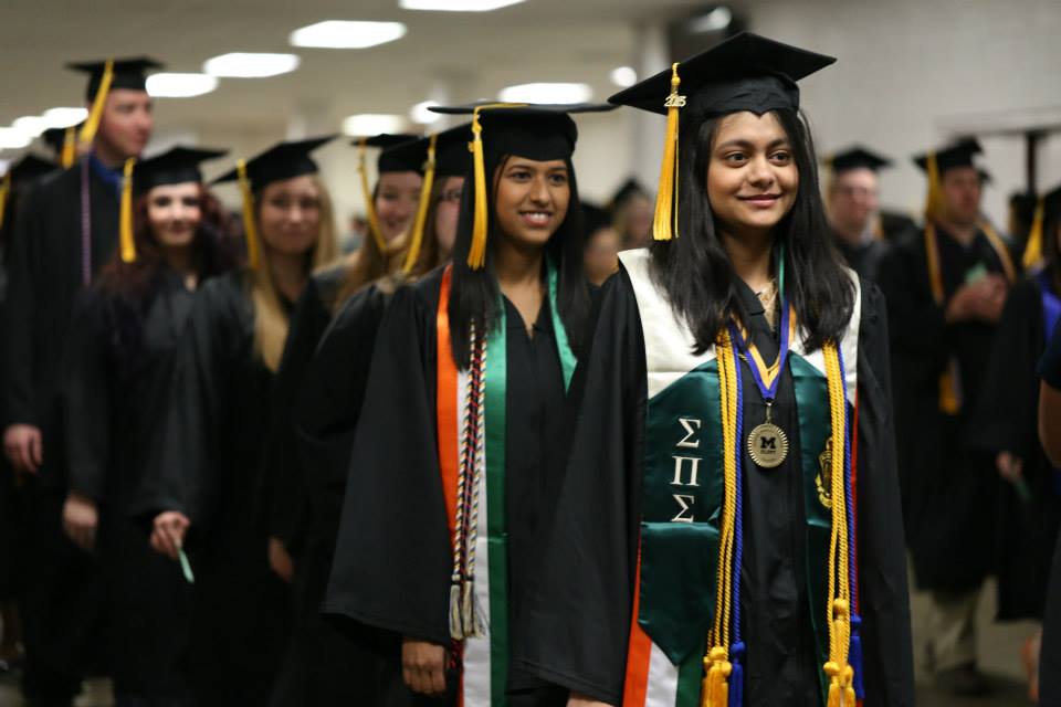 Ayana in graduation regalia