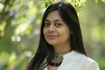 Headshot of Ayana Ghosh in nature