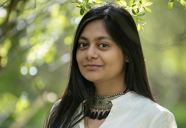 Headshot of Ayana Ghosh in nature